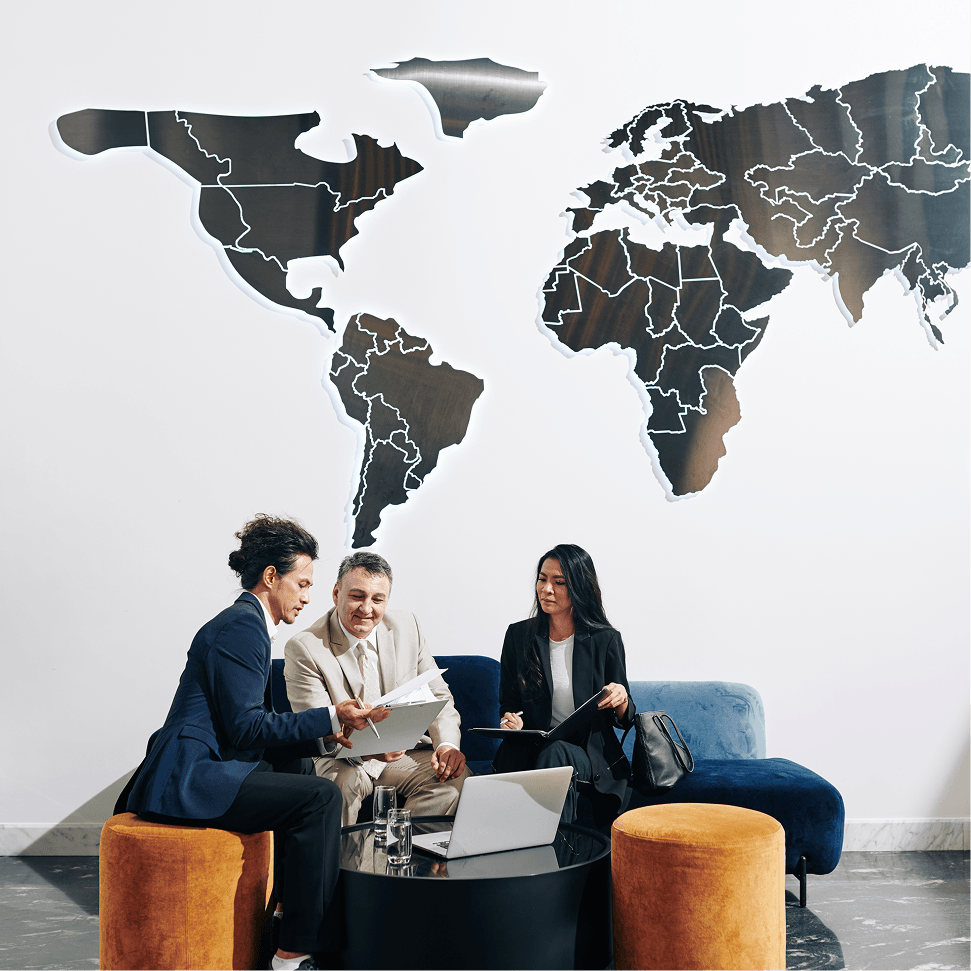Business meeting in lounge with world map